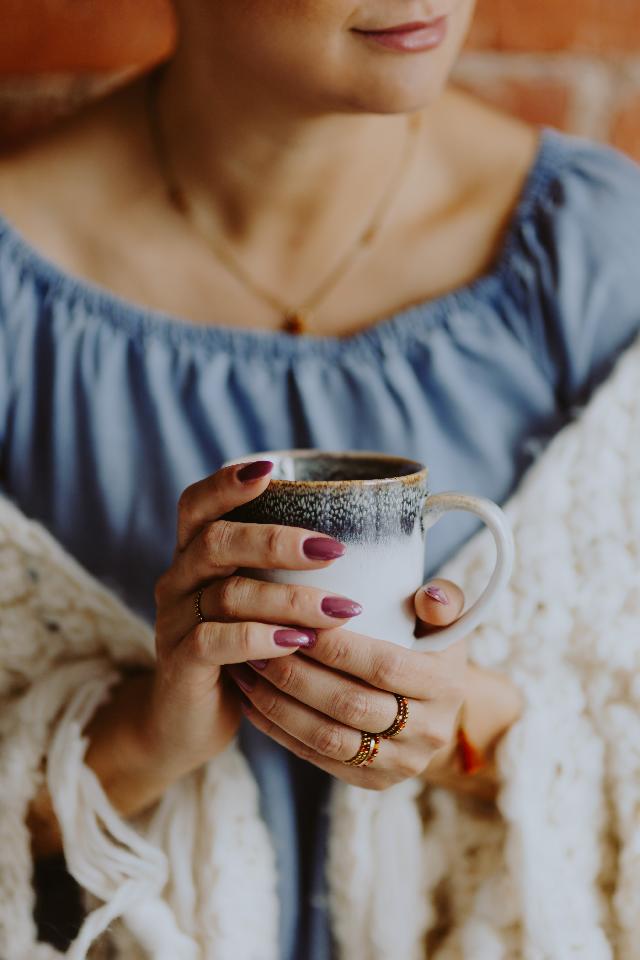 Woman holding coffee cup | Therapy for Codependency in Woodland Hills